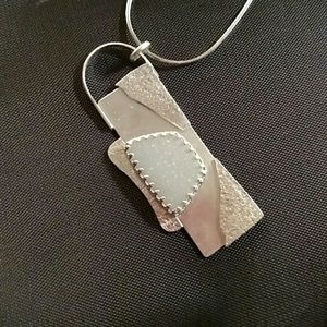 Opal in sterling silver.